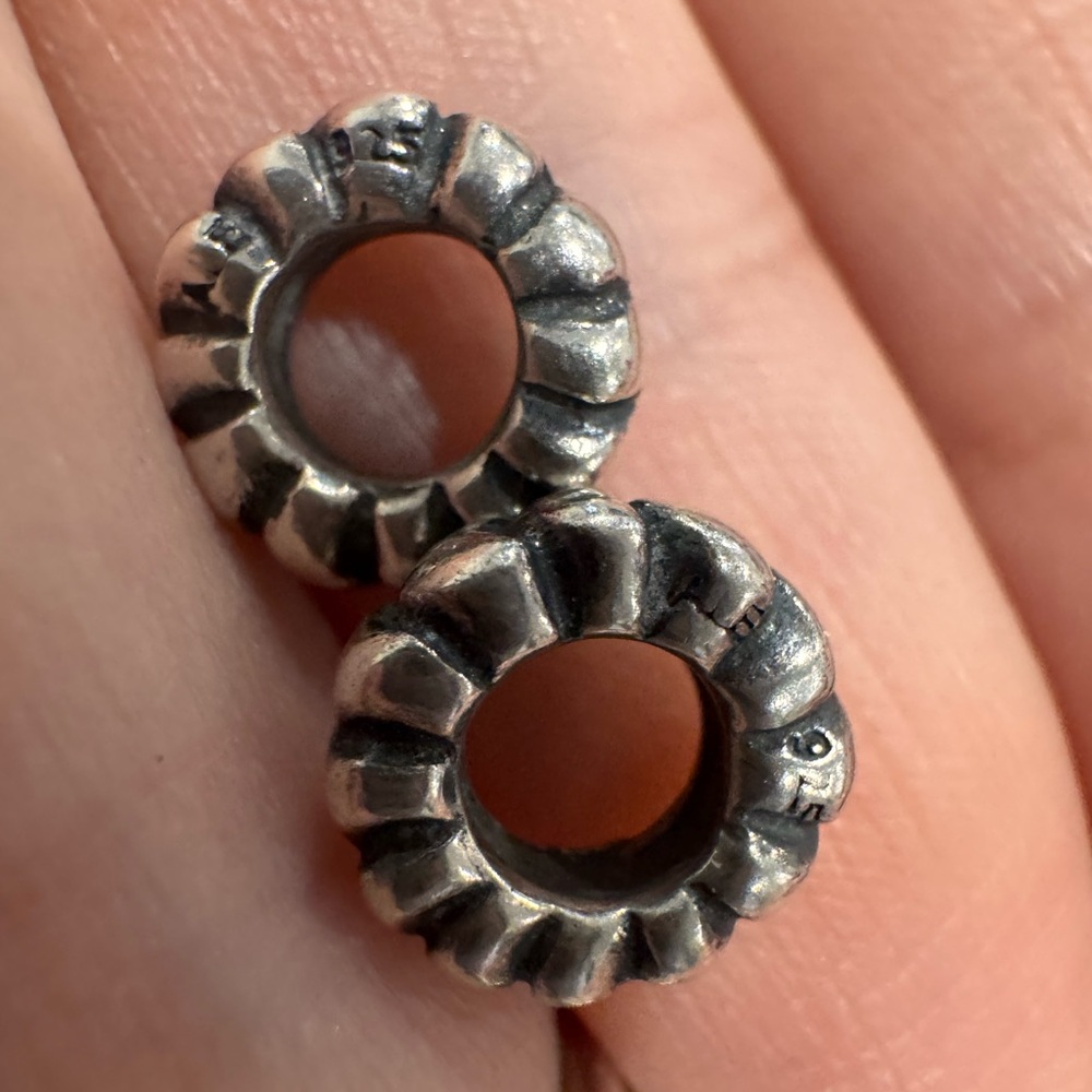 two Pandora silver charms
